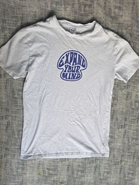 TNA White Tee with Blue 'Expand Your Mind' Graphic